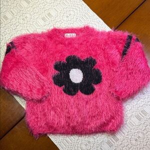 Girl’s Fluffy Pink Sweater with Black Flower Design Size 4